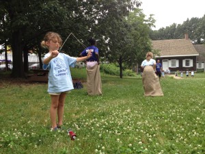 Children from a summer camp visit the Wyckoff farmhouse