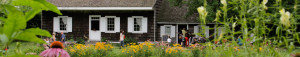 Visitors enjoy the Wyckoff House Museum grounds on a summer day