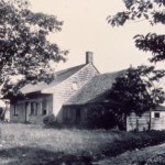 Historic photo of the Wyckoff farmhouse from after 1903